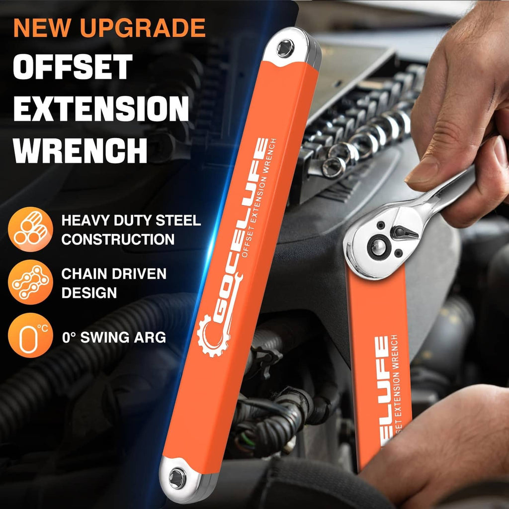 Orange offset extension wrench with angled head held near engine components.