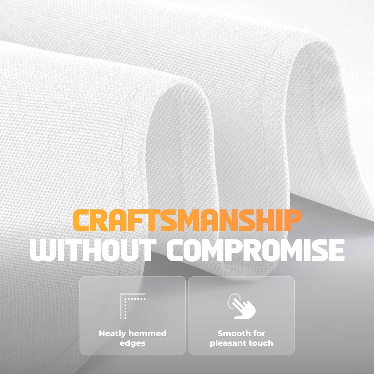 White tablecloth fabric close-up with neatly hemmed edges