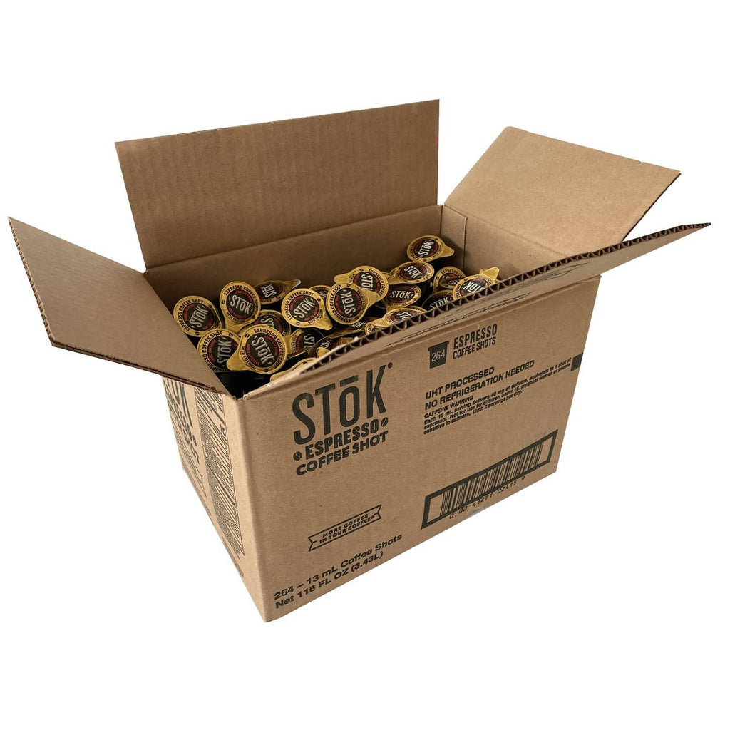 Coffee shot singles multipack in open cardboard box with yellow Stok caps