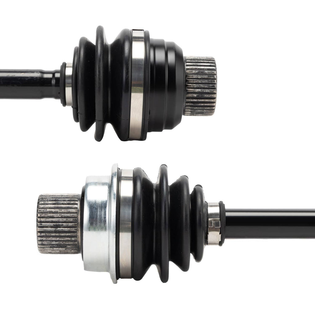Front differential drive shaft coupler close-up with ribbed metal end and rubber boot