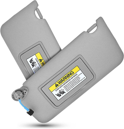 Gray sun visor pair with hinged warning labels and small mirror mount detail