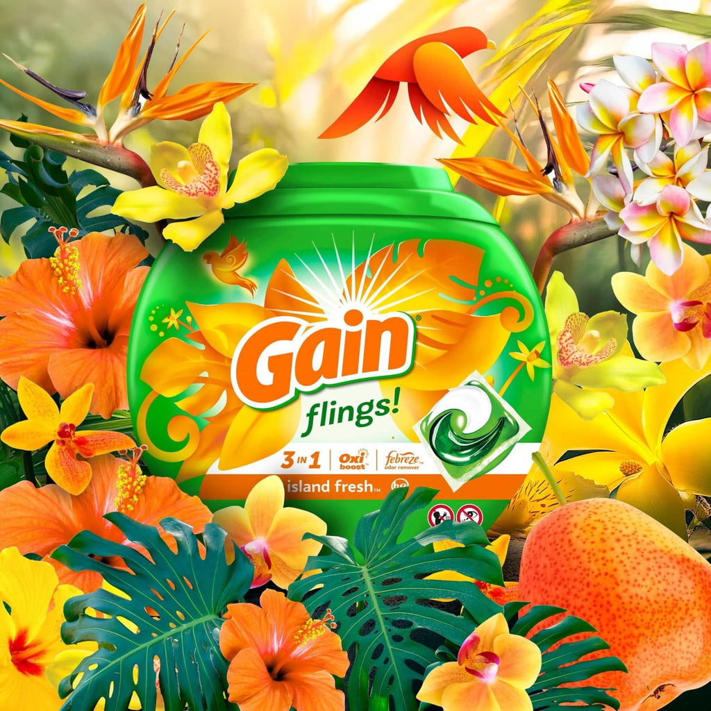 Gain flings laundry detergent pacs container with bright tropical flowers around