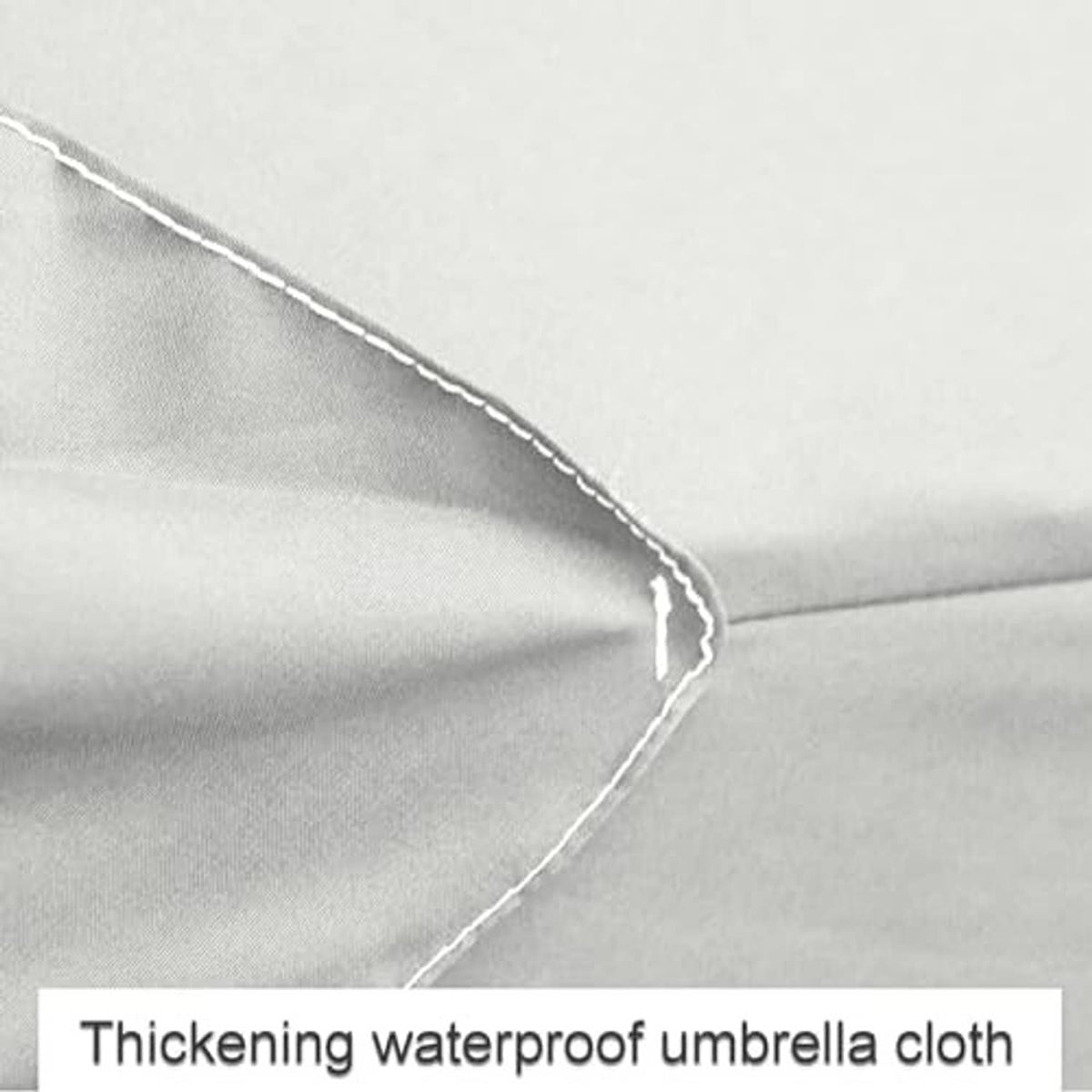 Grey patio umbrella replacement cover fabric with stitched edge and folded seam