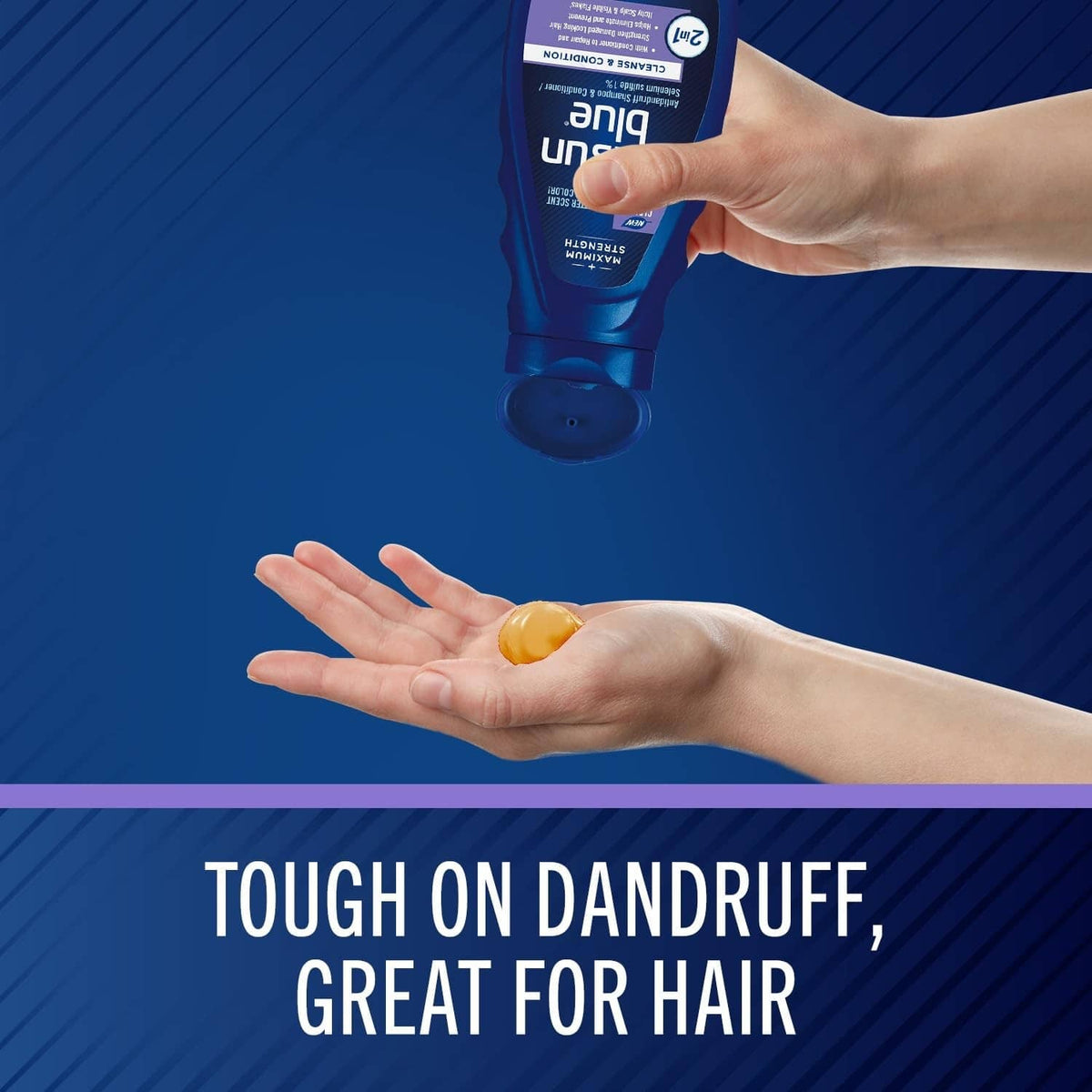 Hands dispensing shampoo from a blue bottle onto the palm