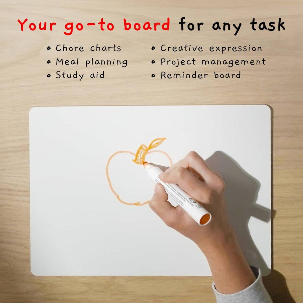 White dry-erase lapboard with marker doodles and a hand writing