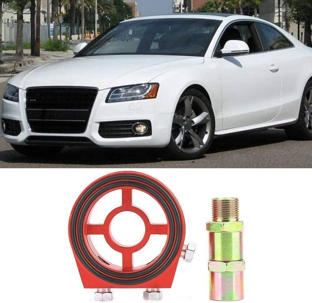 Red aluminum oil filter sandwich adapter plate kit with fittings, shown with vehicle