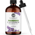 Lavender essential oil bottle with black cap and dropper