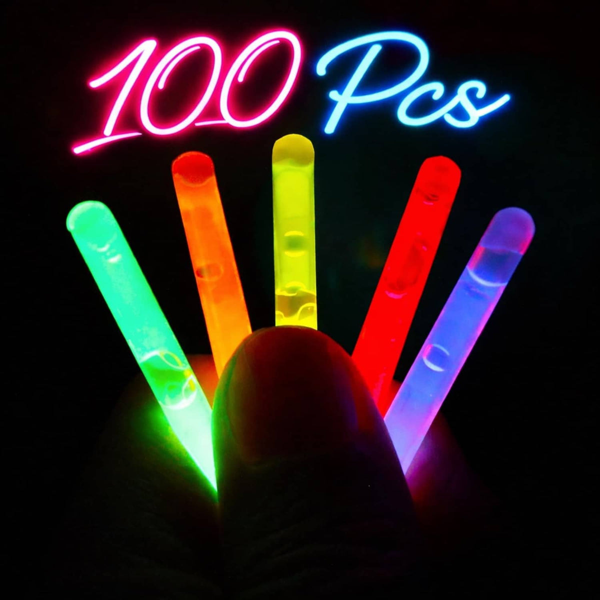 Assorted mini glow sticks held upright, glowing red, yellow, green, blue, and pink