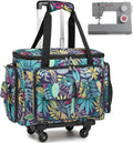 Rolling sewing machine tote case with wheels, black handles, colorful leaf print front.