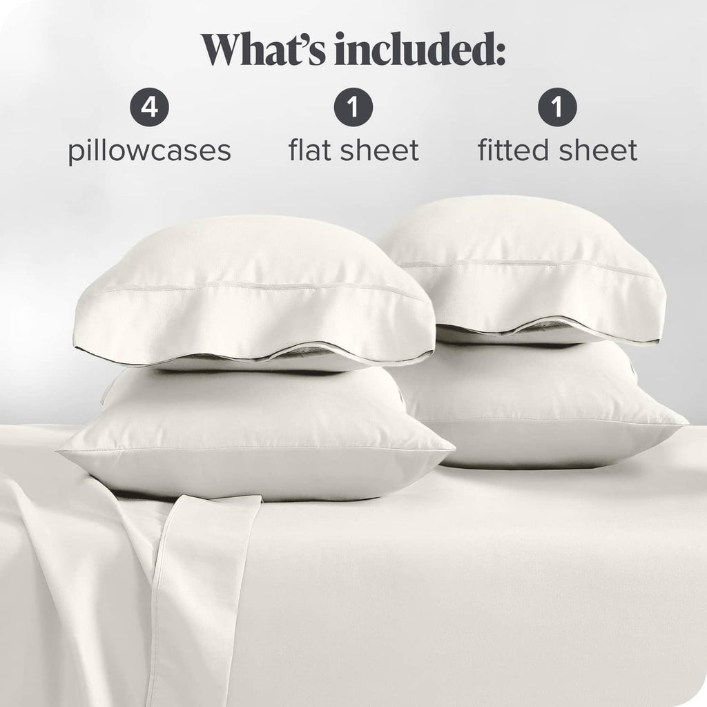 Cream microfiber pillowcases and sheets set displayed with folded bedding pieces