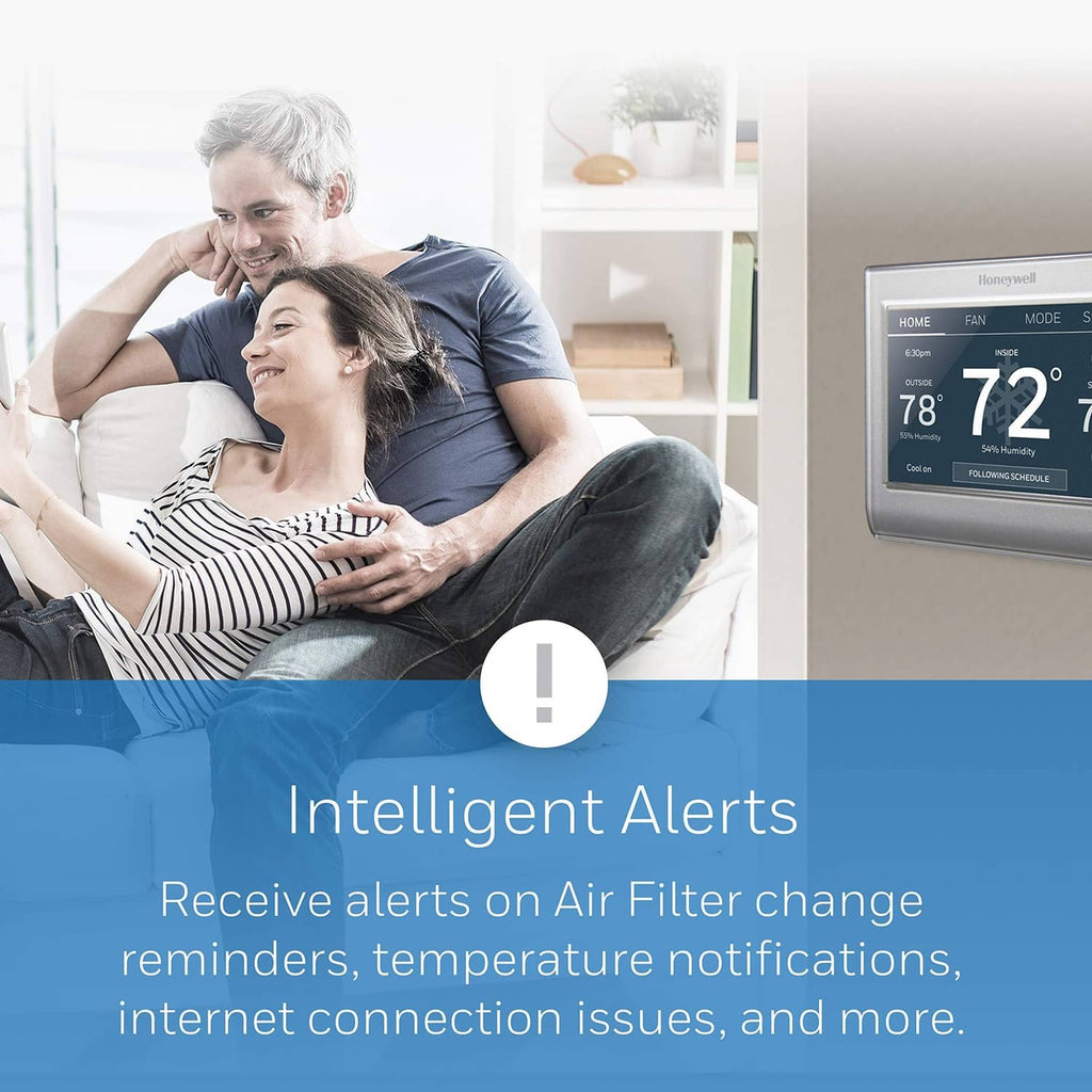 Honeywell Home gray wall thermostat with touchscreen showing indoor/outdoor readings