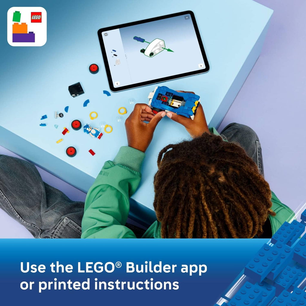 LEGO build set with hands assembling a blue race car on a tablet guide