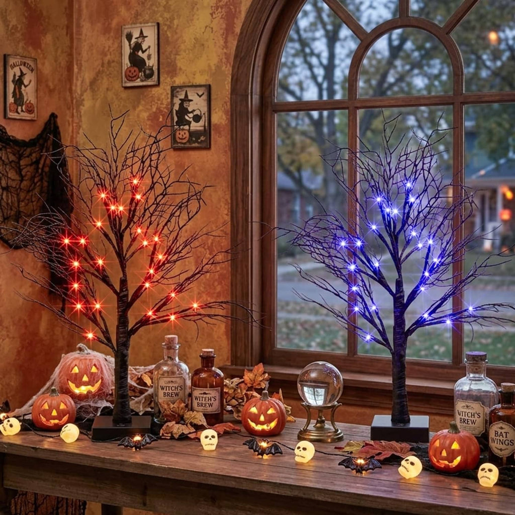 Lighted Halloween decorative tree with orange and purple LED lights on a dark base