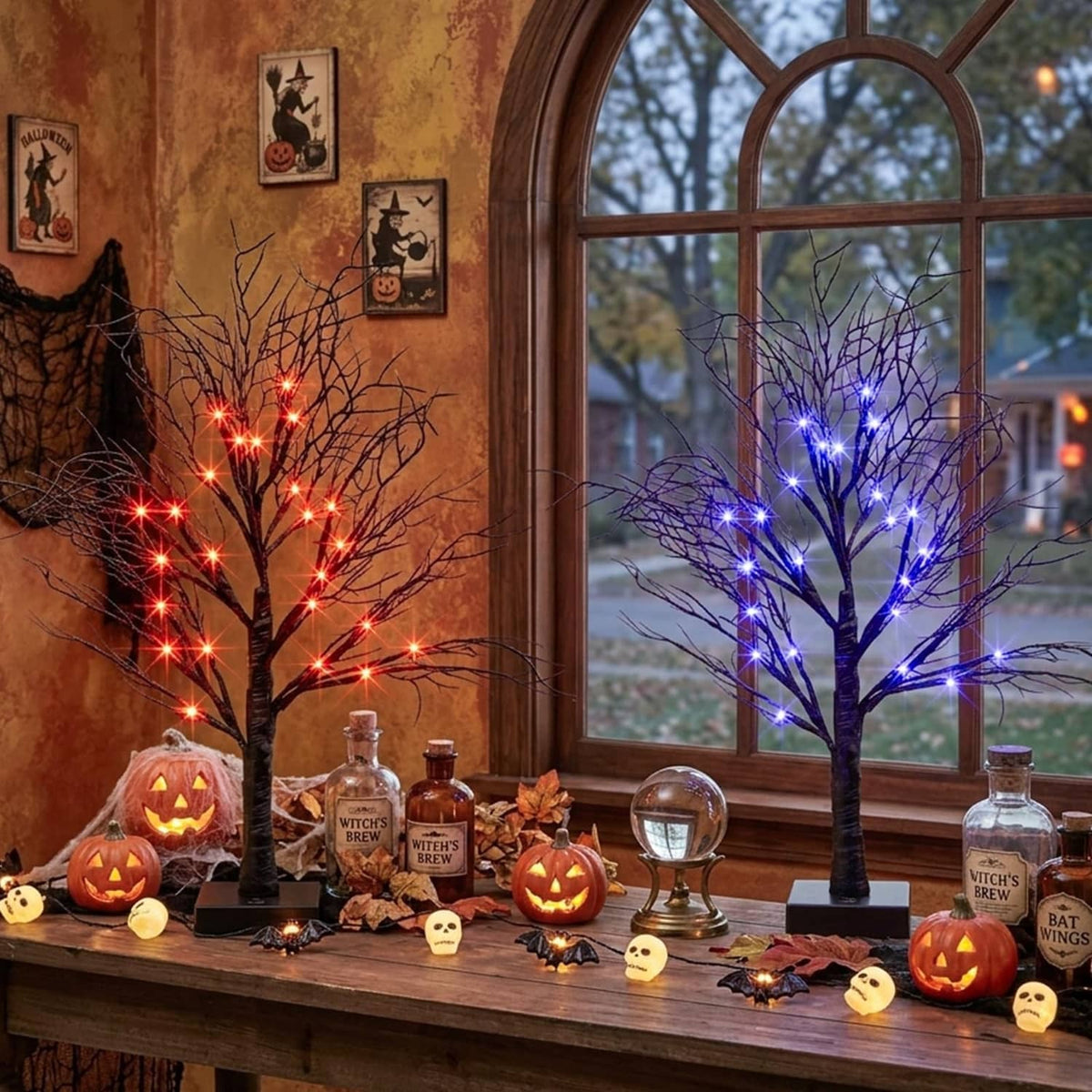Lighted Halloween decorative tree with orange and purple LED lights on a dark base