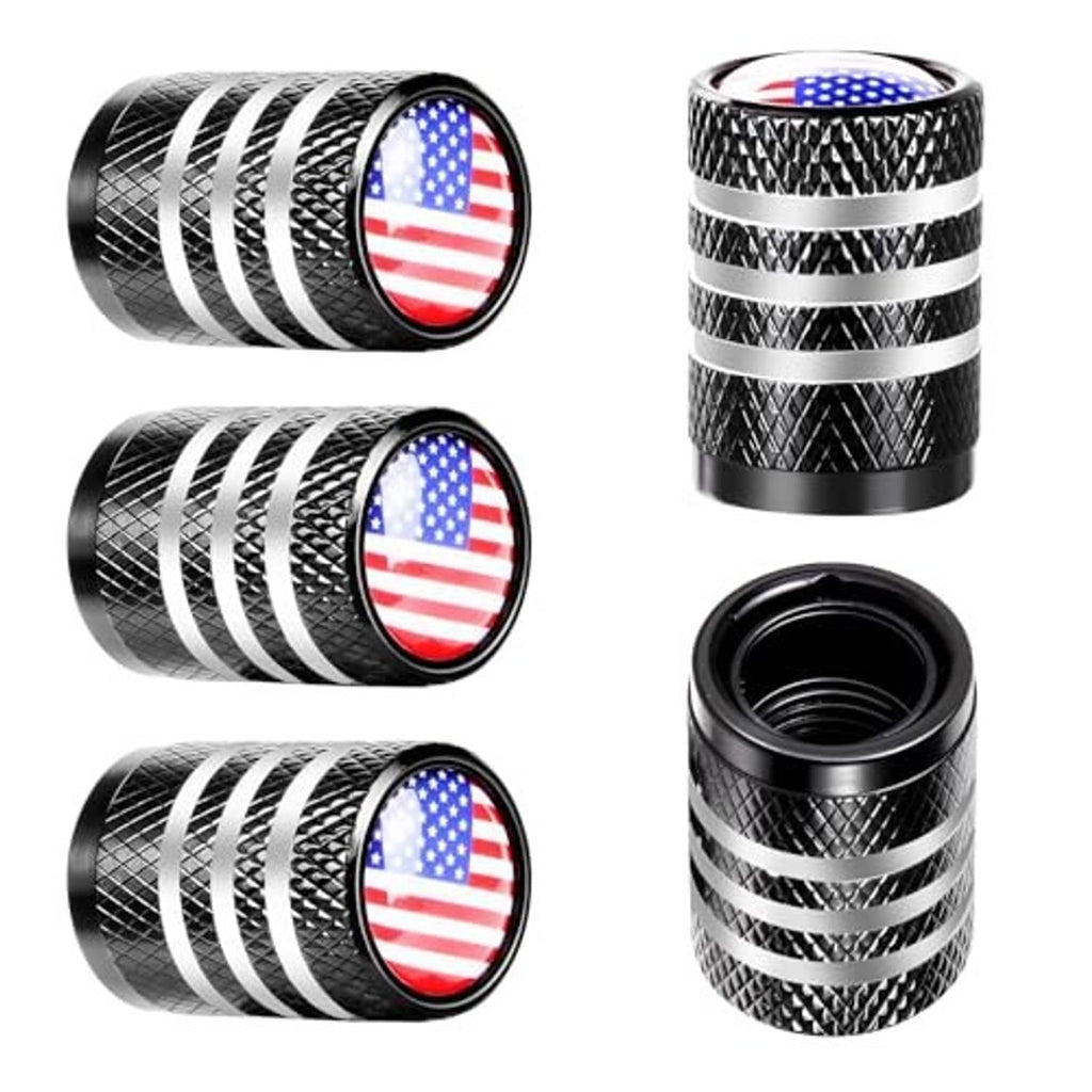Black tire valve stem caps with U.S. flag emblem tops, silver stripes, and one open cap.