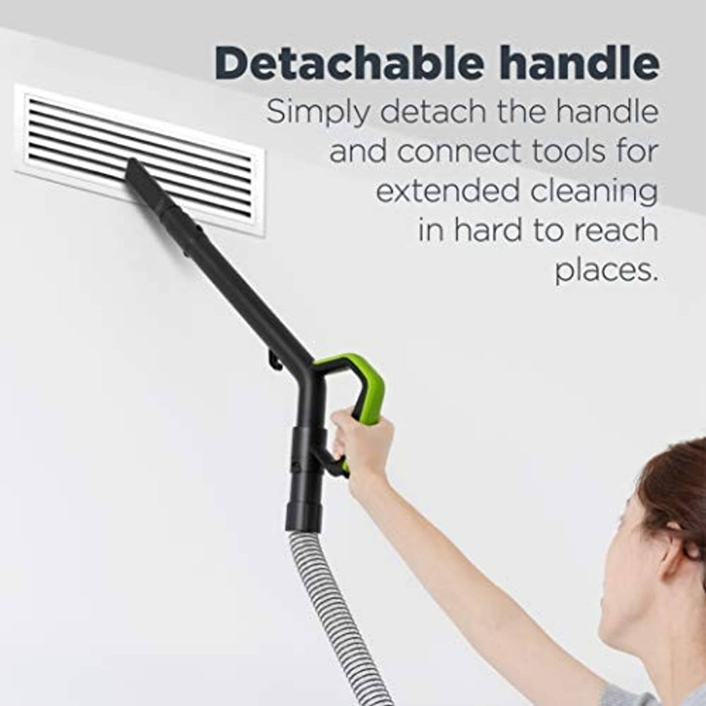 Green bagless upright vacuum with detachable handle for reaching above-floor vents