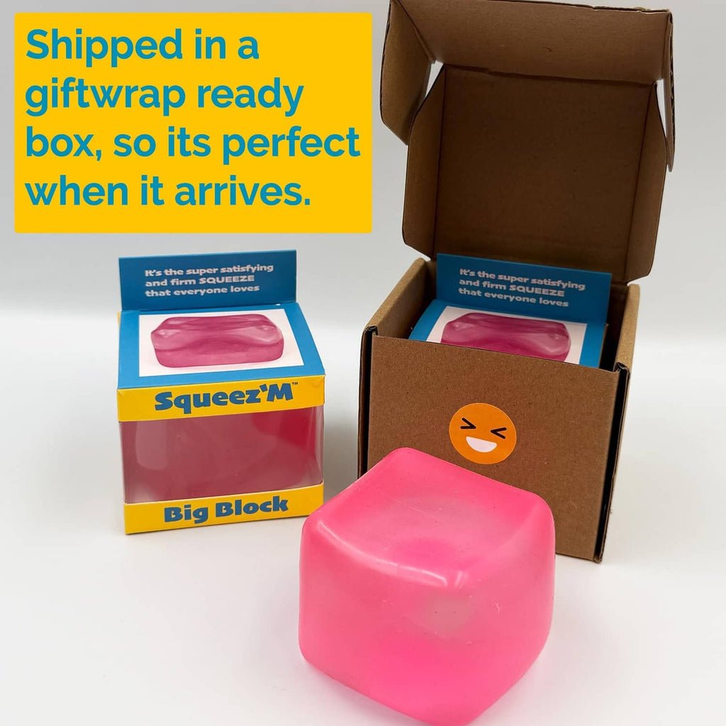 Pink squishy block cube in open gift-ready box