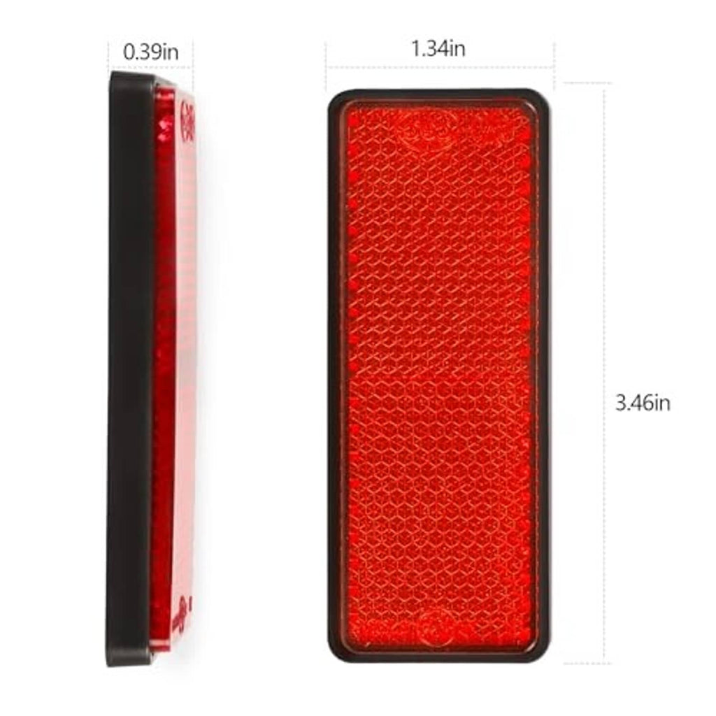 Red rectangle reflector shown thin side and front face, black frame edges