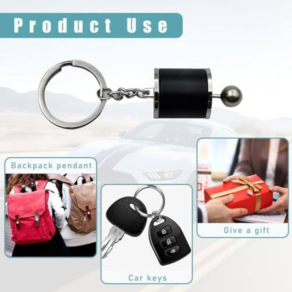 Car gear shifter keychain with black cylinder, silver lever ball, and keyring