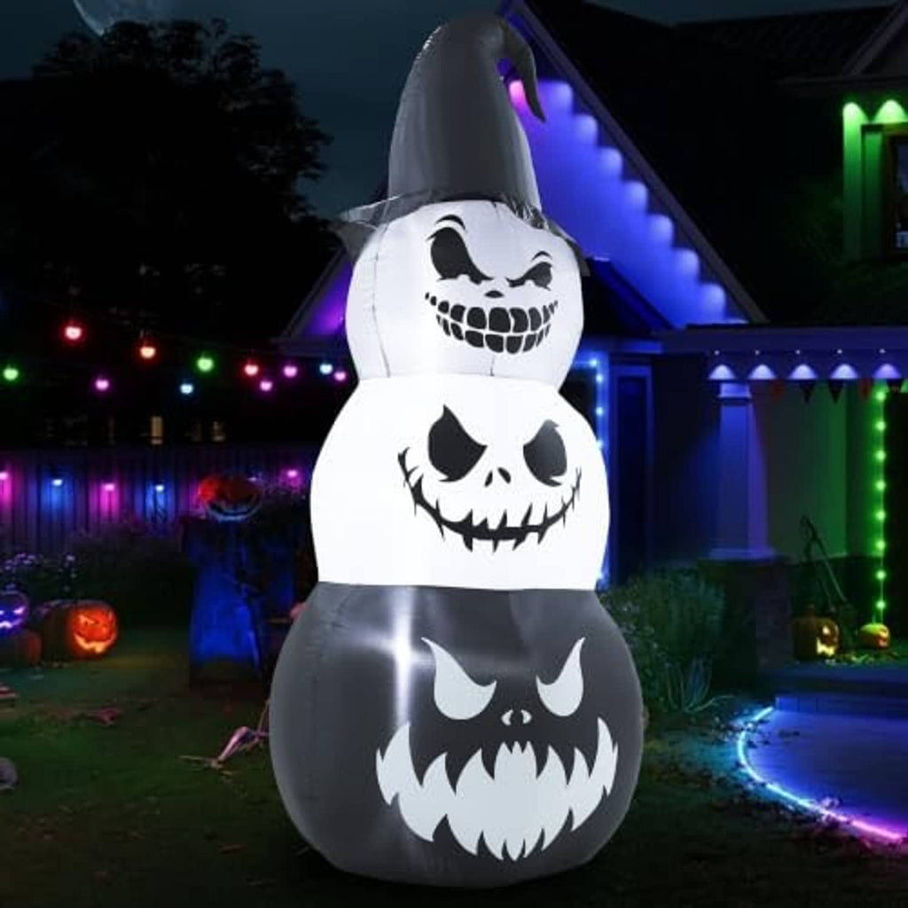 Angled inflatable Halloween pumpkin stack with witch hat and spooky pumpkin face