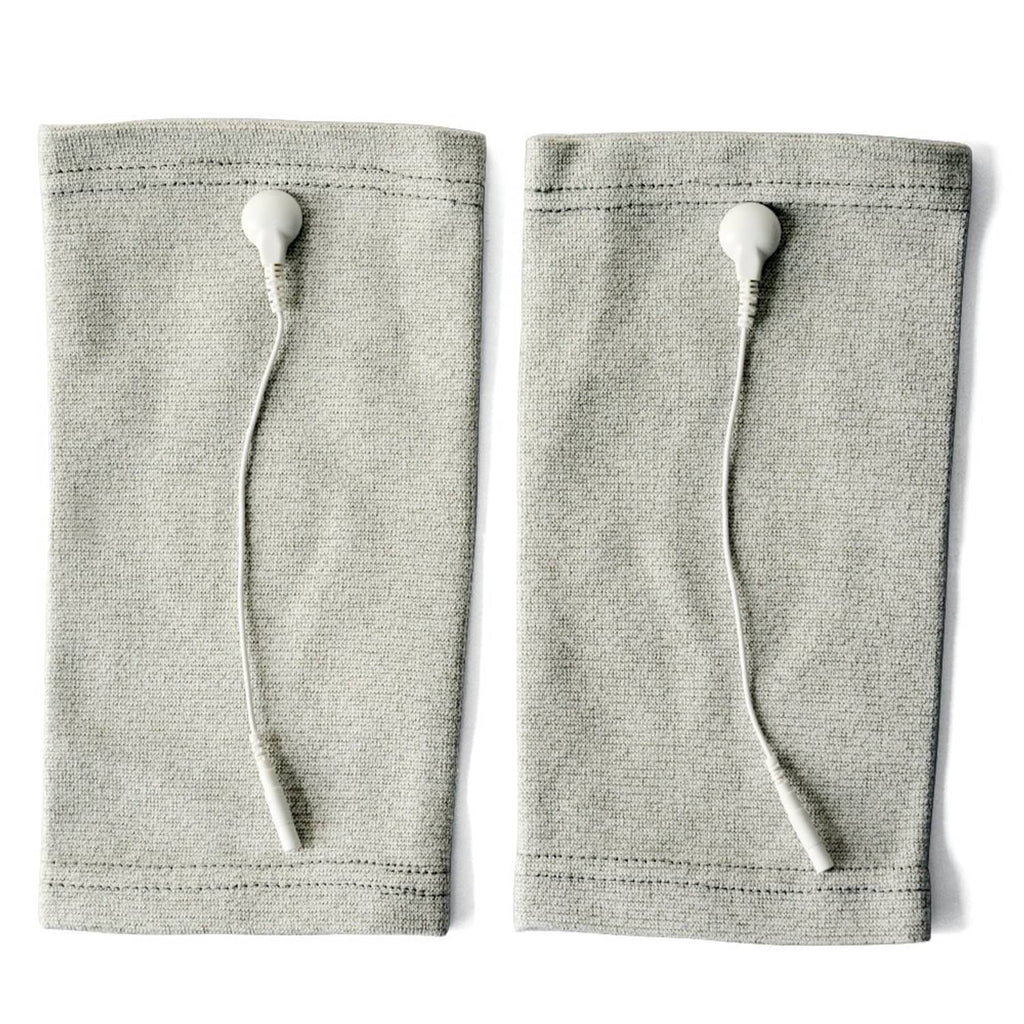 Grey conductive electrode sleeve pair with white button electrodes and lead wires