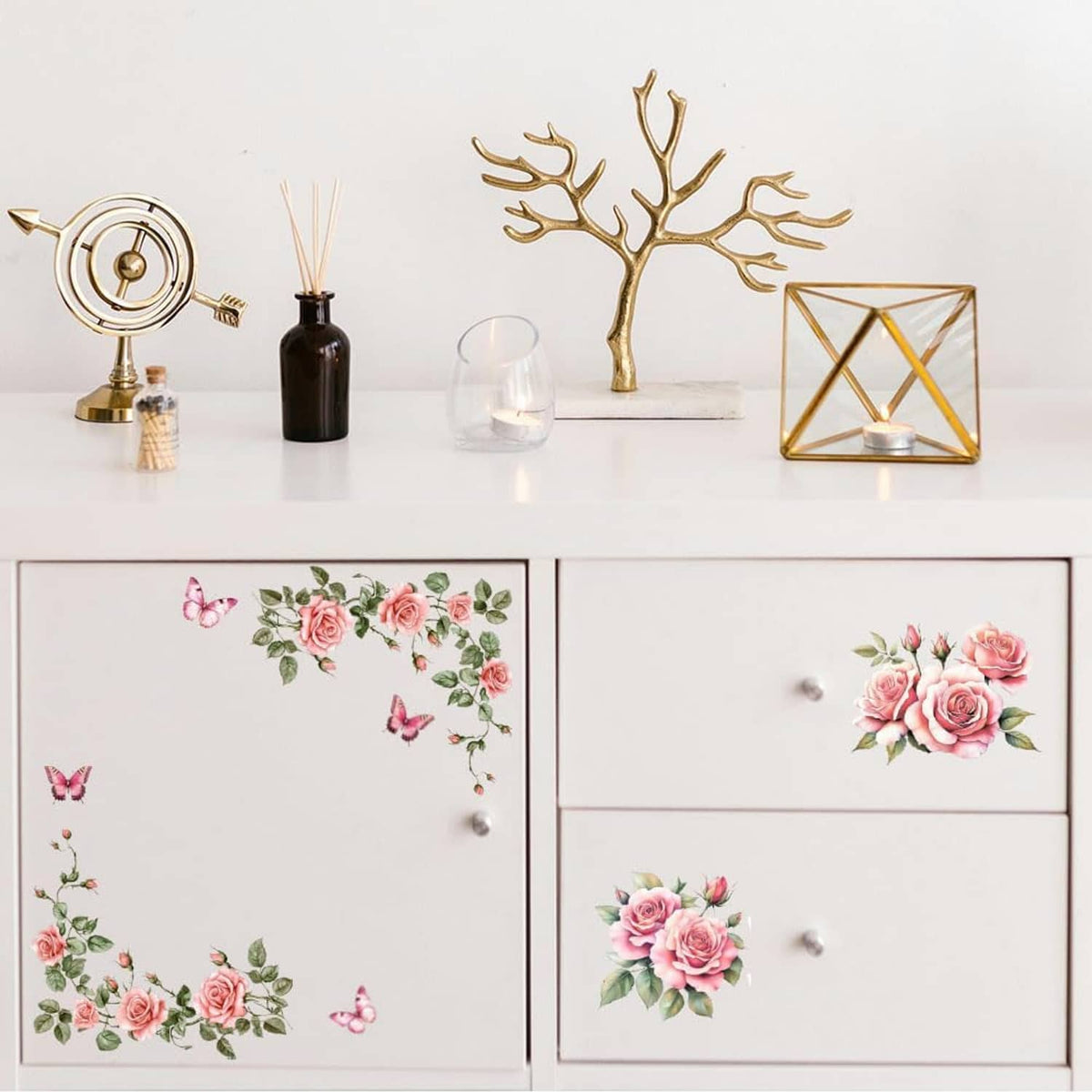 Pink rose rub-on transfer stickers on light drawers and furniture surfaces