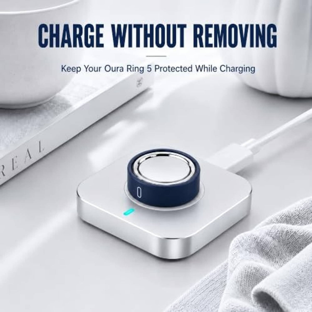 Navy silicone ring cover placed on a charging dock, shown while charging.