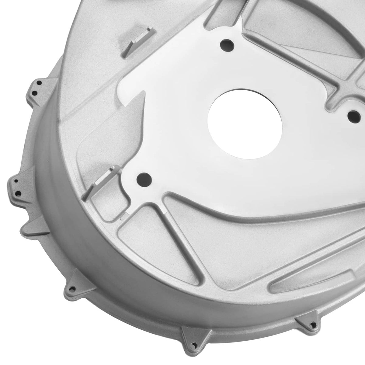 Aluminum inner clutch cover close-up, light gray with machined ribs and round access hole