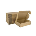 Small corrugated shipping boxes pack, one open box with stacked boxes behind