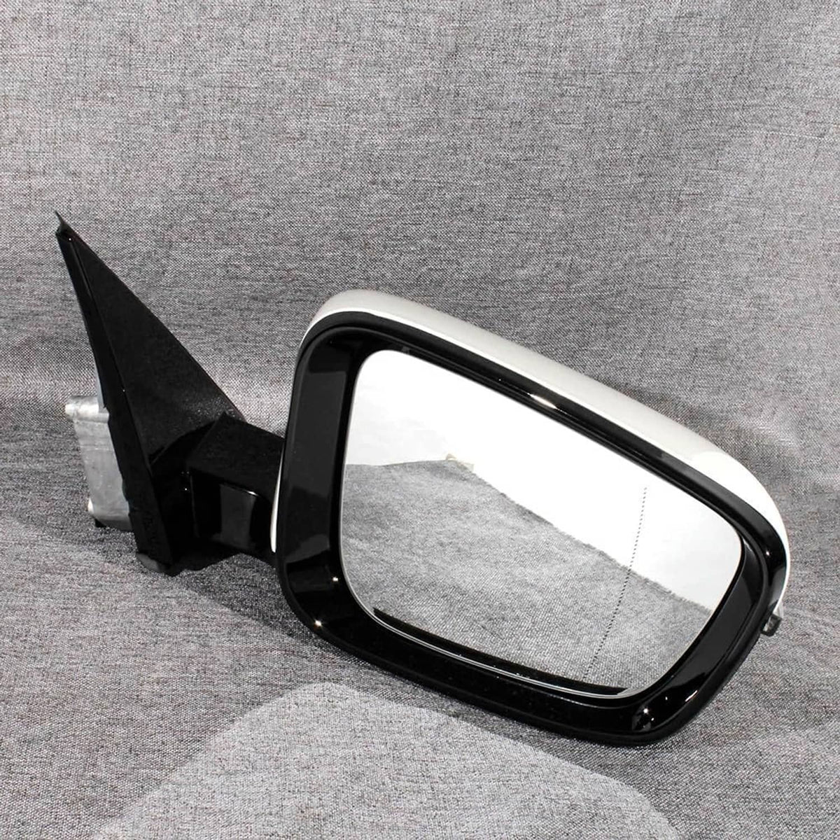White passenger side mirror with black housing and glossy black trim