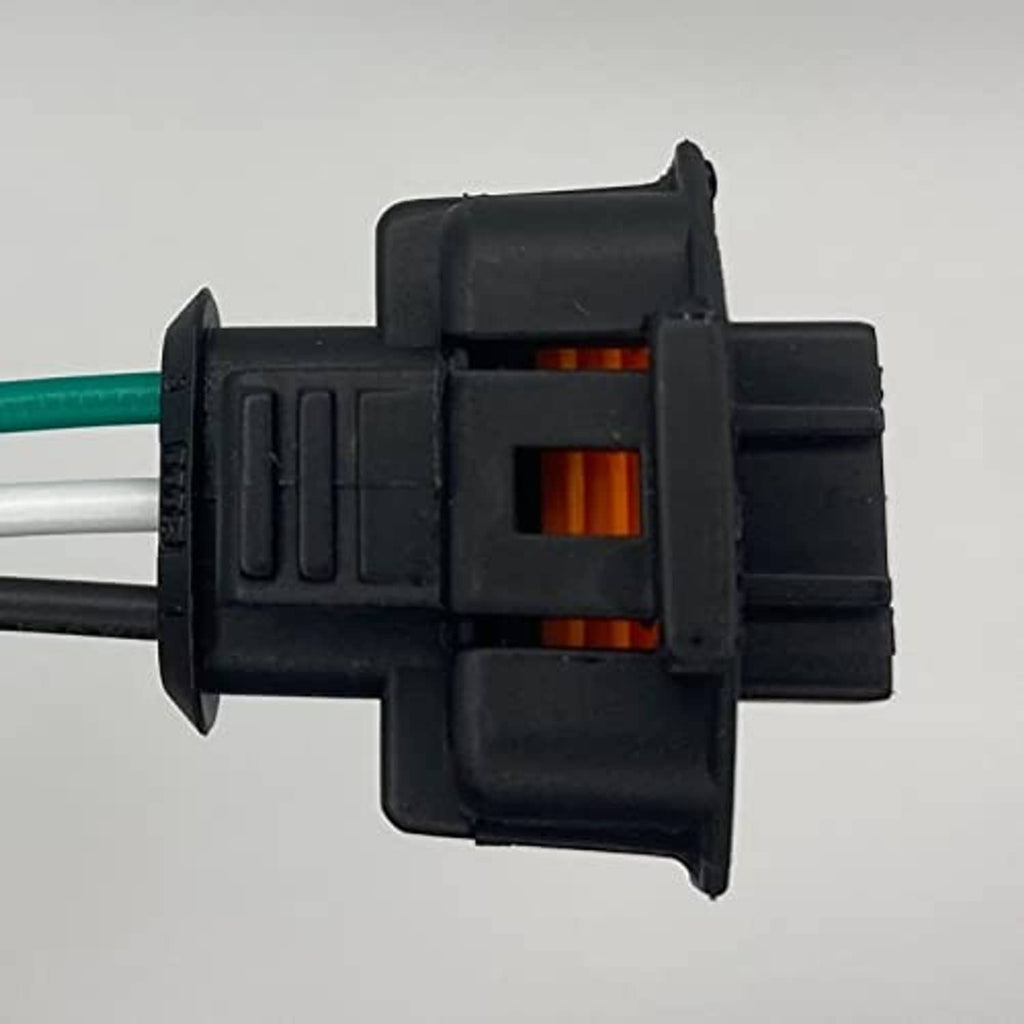 Throttle position sensor connector with green wire lead and orange terminal blocks