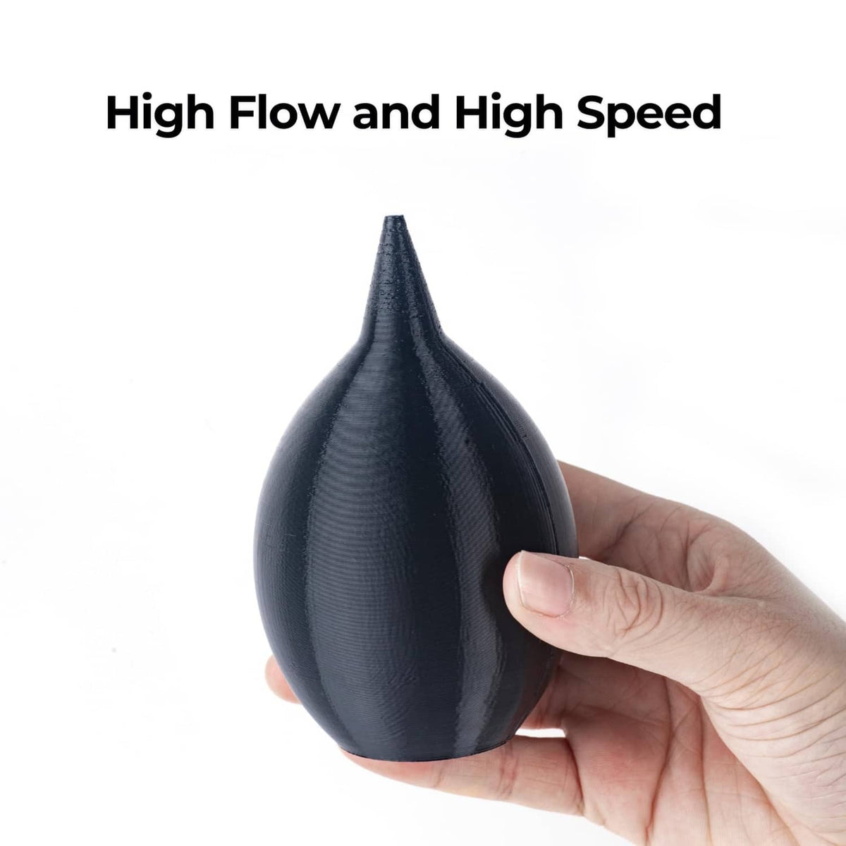 Black TPU 3D printed flexible drop-shaped sample held in hand