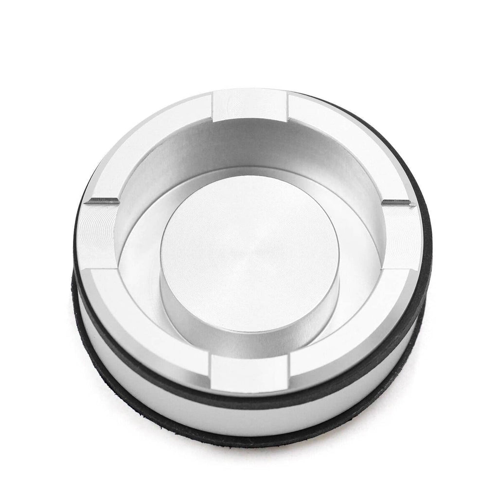 Pinless accumulator piston with black outer ring and silver stepped metal housing