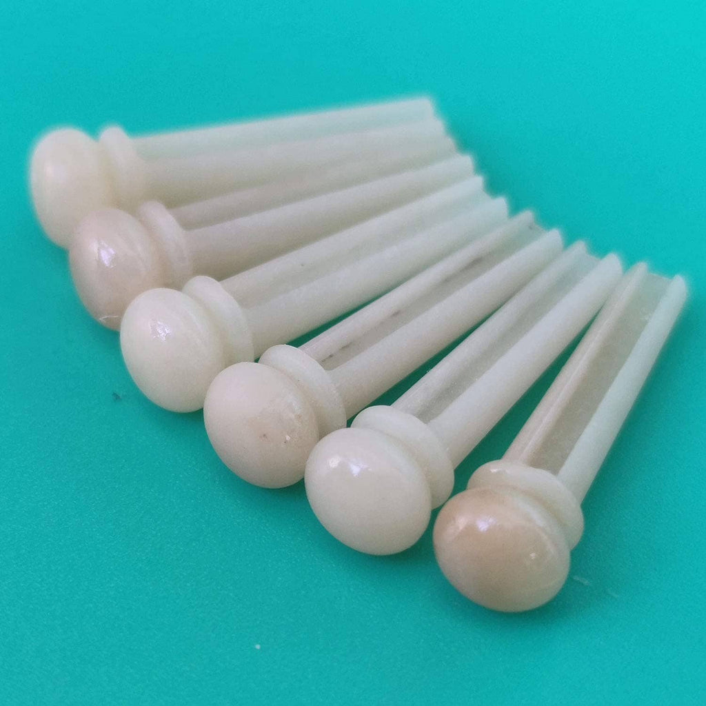 White bone acoustic guitar bridge pins with rounded heads, 6-piece set
