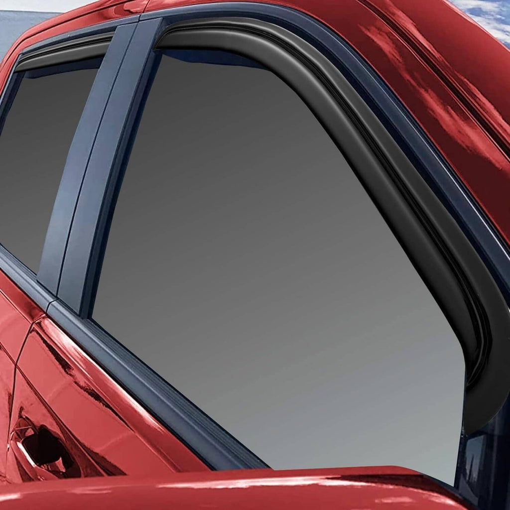 Black window visor installed on a truck window