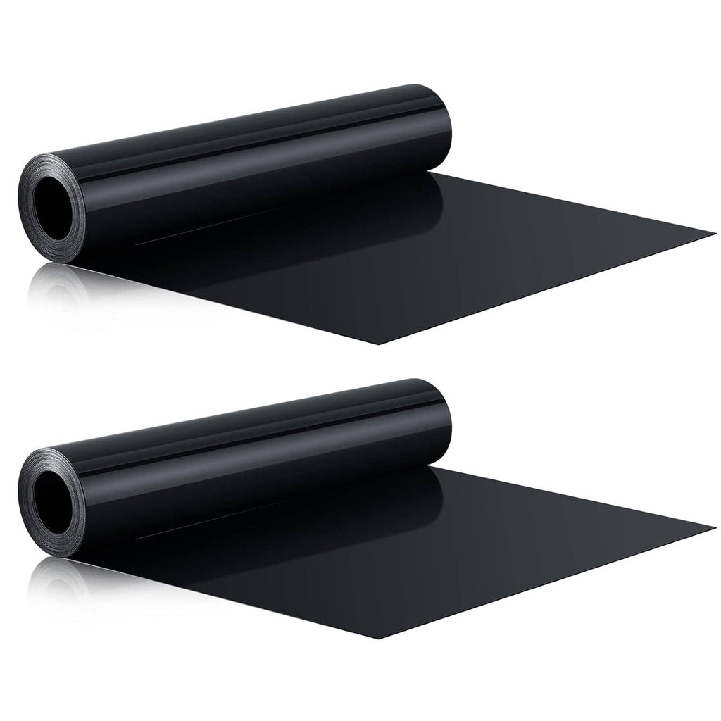 Two black HDPE drainage membrane rolls with extended dark sheet panels
