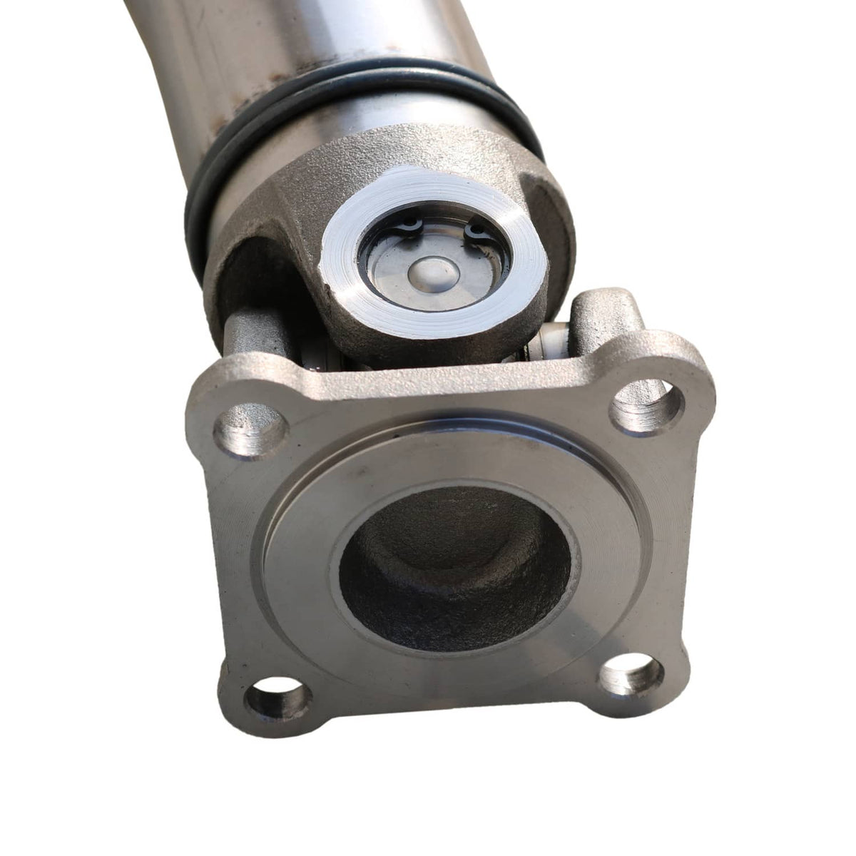 Rear driveshaft prop shaft hub with circular opening, black seal, and bolt pattern