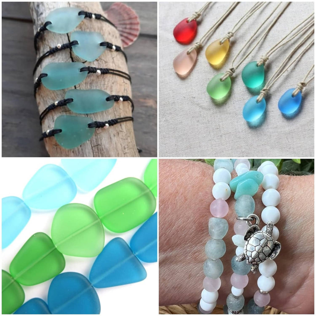 Assorted teardrop beads and pendant necklaces in red, gold, green, teal, and blue.