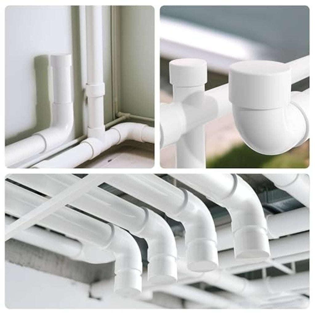 White PVC pipe end caps covering pipe ends in a plumbing installation