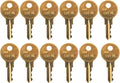 Pack of 12 brass dispenser keys with CAT 74 stamped on key heads
