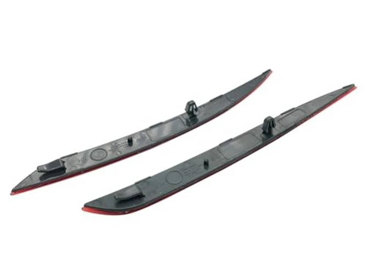 Set of black-backed reflector strips with red lens edges for rear bumper