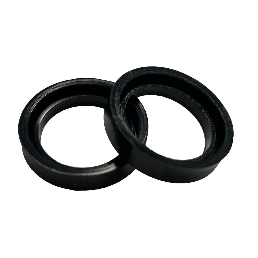 Pair of black round gasket seals, stacked and overlapping
