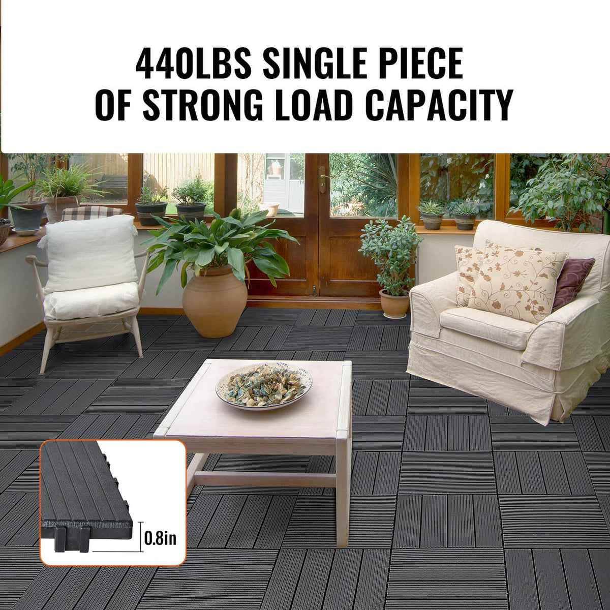 Dark grey interlocking deck tiles with grooved surface and interlocking edge seams