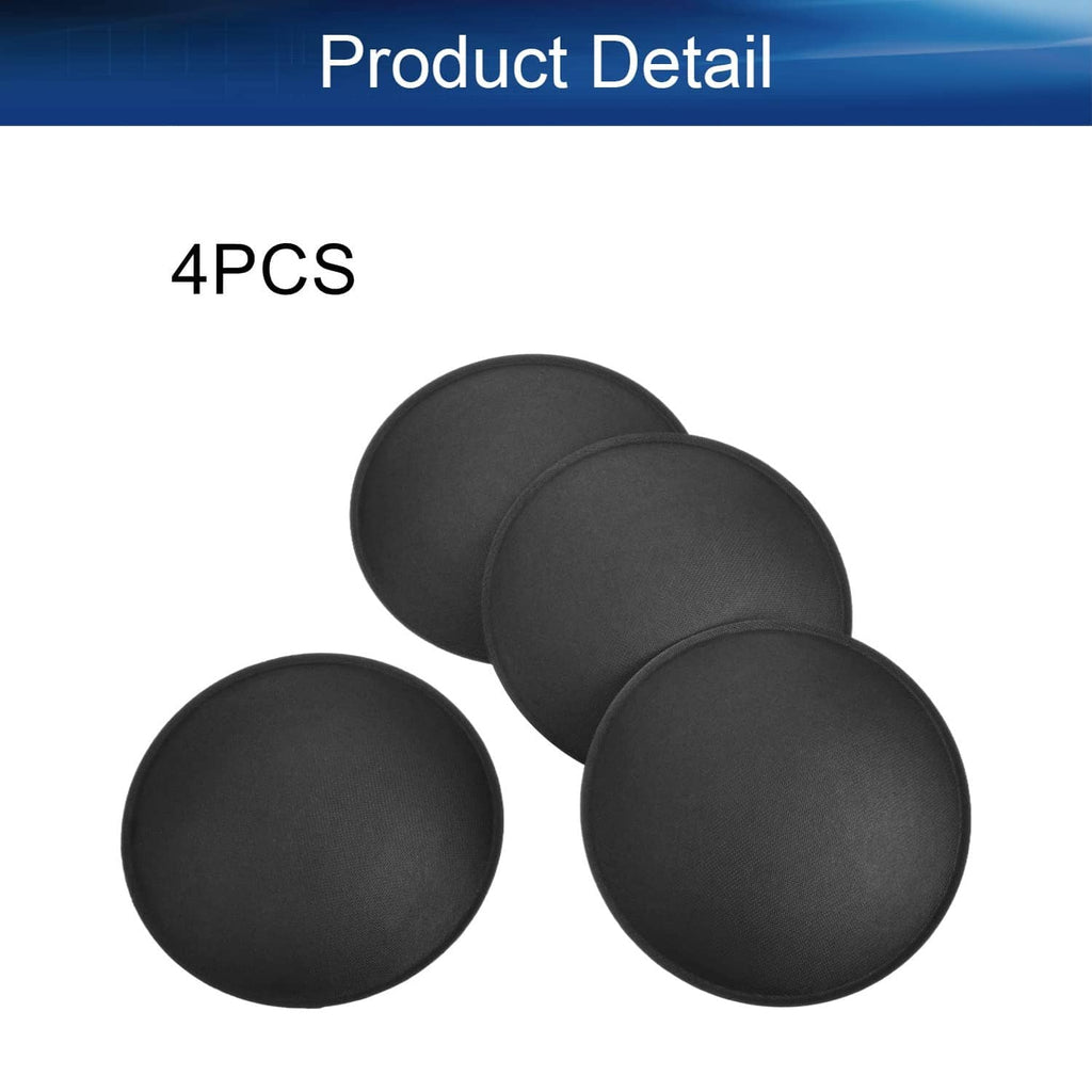 Four black speaker dust cap domes, round disks stacked at different angles