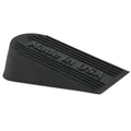 Black rubber door stopper with embossed 'Made in USA' text