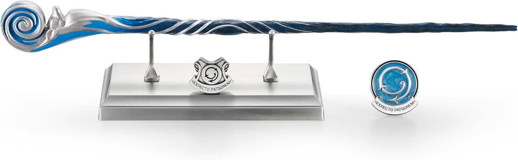 Silver wand with blue spiral head on silver stand base and small circular blue medallion