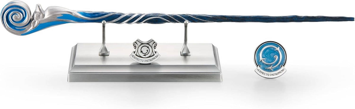 Silver wand with blue spiral head on silver stand base and small circular blue medallion