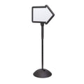 Black directional arrow dry-erase sign on freestanding adjustable stand