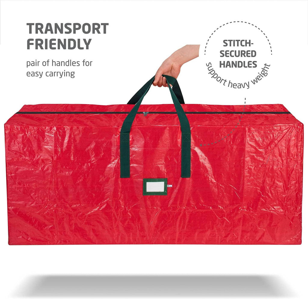 Red Christmas tree storage bag with sturdy green handles and center label patch