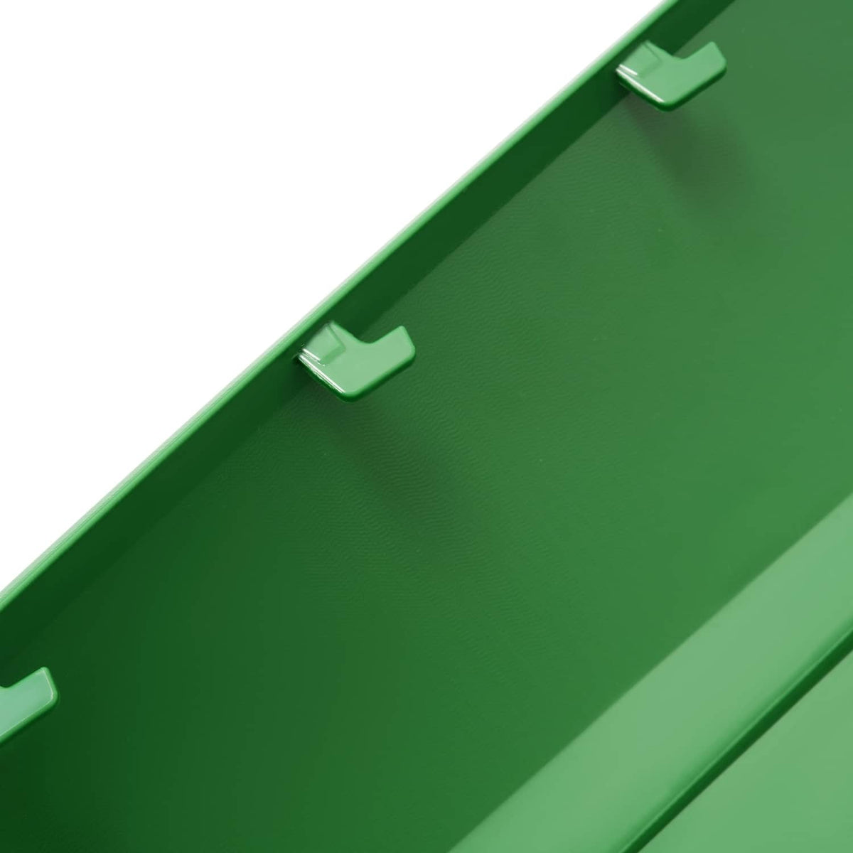 Green right hood panel top edge with molded clips and vent channel